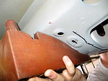 3D printed hanger piece allows for testing of vehicle production on the production line
