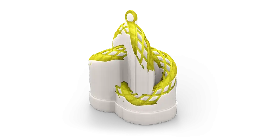 A jewelry cast made with VisiJet M2P-CST Crystal material showing the support material